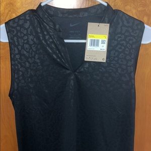 Ladies size small Nike golf shirt
